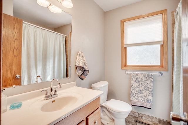 5371 Hugo Rd, White Bear Twp, MN 55110 - bathroom featuring vanity and toilet