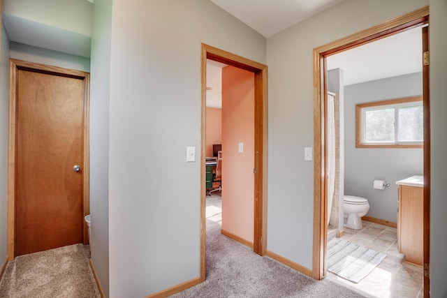 5371 Hugo Rd, White Bear Twp, MN 55110 - corridor featuring baseboards, carpet floors, and an office area