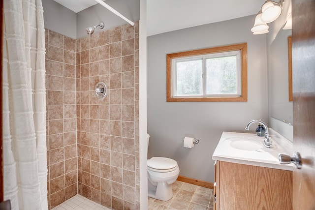 5371 Hugo Rd, White Bear Twp, MN 55110 - full bath with vanity, tiled shower, toilet, and baseboards