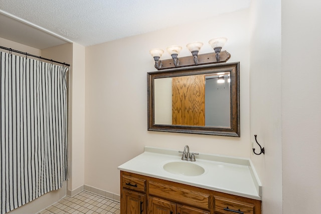 8762 Highwood Way, Apple Valley, MN 55124 - bathroom featuring vanity, tile patterned floors, baseboards, and curtained shower