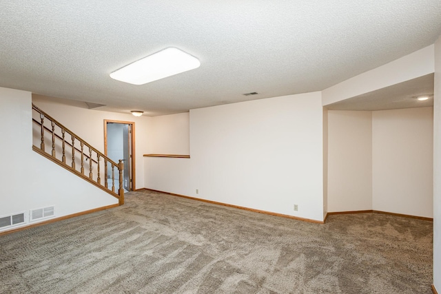 8762 Highwood Way, Apple Valley, MN 55124 - finished basement featuring carpet, baseboards, a textured ceiling, and stairs