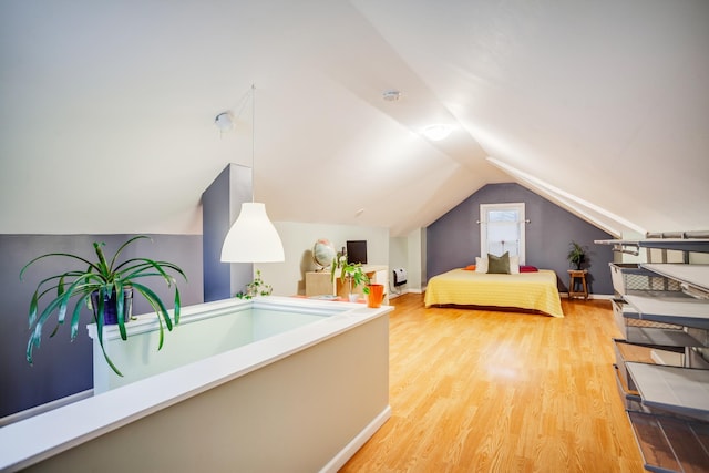 4830 29th Ave S, Minneapolis, MN 55417 - bedroom with light wood finished floors and vaulted ceiling