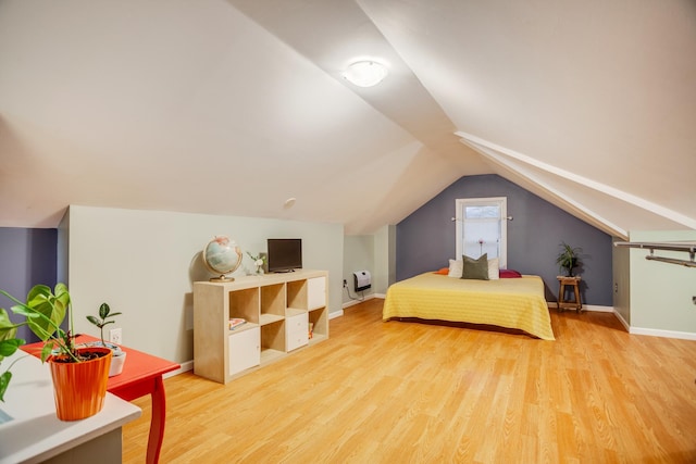4830 29th Ave S, Minneapolis, MN 55417 - bedroom with light wood-style flooring and lofted ceiling