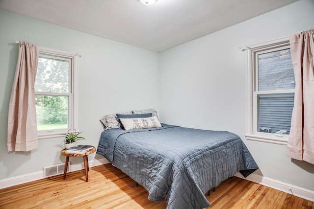 4830 29th Ave S, Minneapolis, MN 55417 - bedroom featuring baseboards and light wood-style flooring
