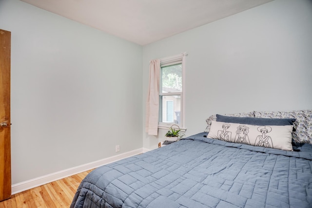4830 29th Ave S, Minneapolis, MN 55417 - bedroom with baseboards and wood finished floors