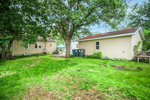 4830 29th Ave S, Minneapolis, MN 55417 - view of grassy yard with a patio area