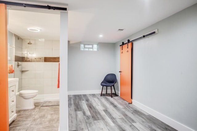 4830 29th Ave S, Minneapolis, MN 55417 - full bath with tiled shower, vanity, wood finished floors, and recessed lighting