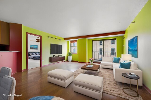 401 1st St Unit 401, Minneapolis, MN 55401 - living area with wood finished floors, baseboards, and a ceiling fan