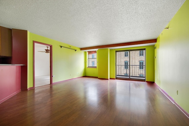 401 1st St Unit 401, Minneapolis, MN 55401 - unfurnished living room with wood finished floors and a textured ceiling