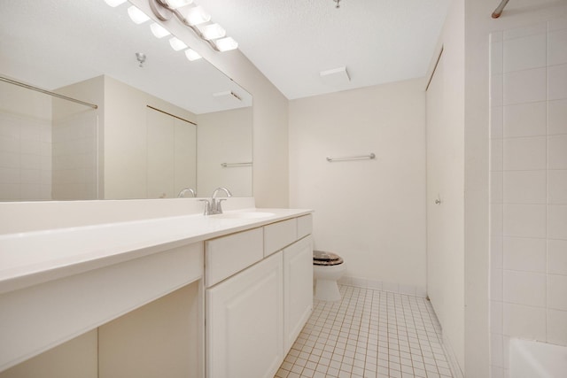 401 1st St Unit 401, Minneapolis, MN 55401 - bathroom with tile patterned flooring, toilet, vanity, and a shower