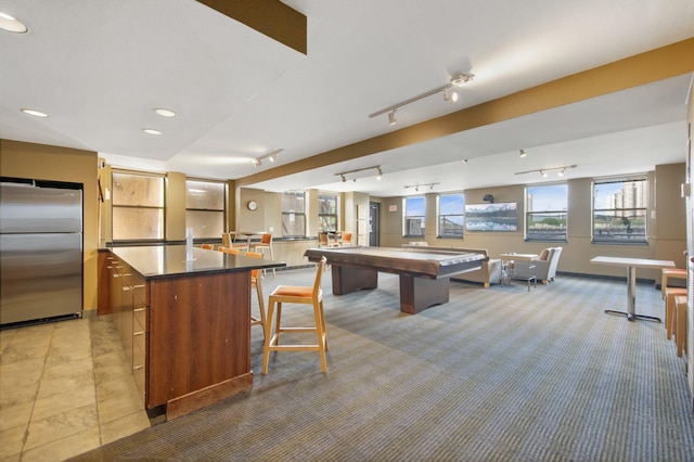 401 1st St Unit 401, Minneapolis, MN 55401 - playroom featuring track lighting, light colored carpet, billiards, and baseboards