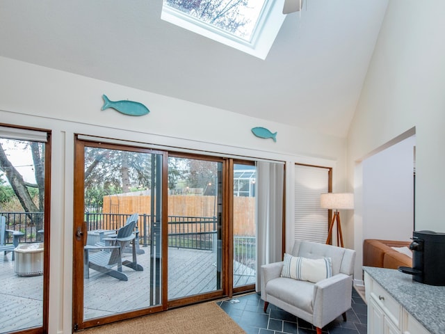 2415 Edgerton St, Little Canada, MN 55117 - doorway to outside featuring a skylight, dark tile patterned floors, and high vaulted ceiling
