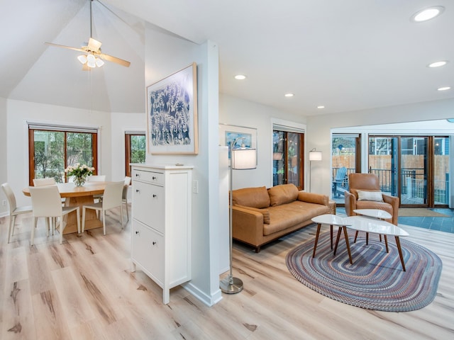 2415 Edgerton St, Little Canada, MN 55117 - living area featuring light wood finished floors, recessed lighting, a ceiling fan, baseboards, and vaulted ceiling