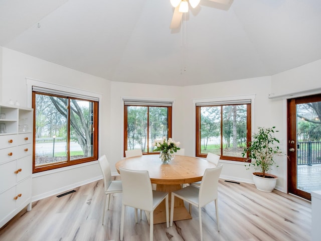 2415 Edgerton St, Little Canada, MN 55117 - dining area with light wood-type flooring, lofted ceiling, baseboards, and ceiling fan