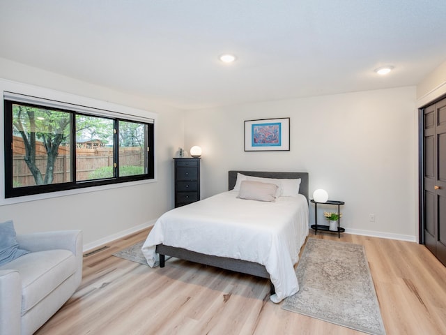 2415 Edgerton St, Little Canada, MN 55117 - bedroom with light wood-style floors, baseboards, and recessed lighting