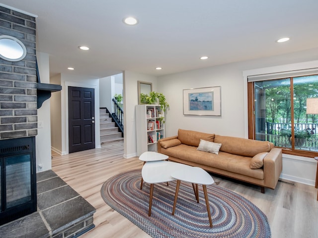 2415 Edgerton St, Little Canada, MN 55117 - living room featuring light wood-style floors, stairway, baseboards, and recessed lighting