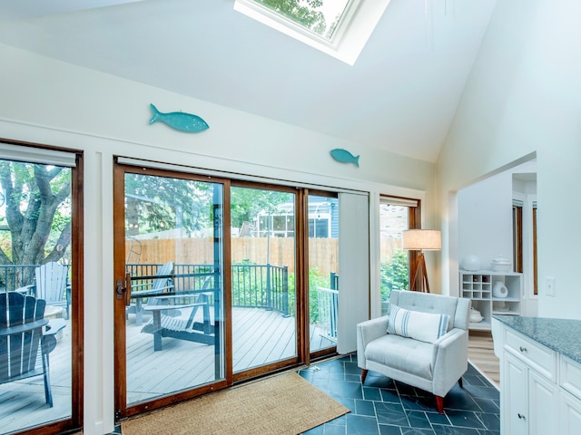2415 Edgerton St, Little Canada, MN 55117 - doorway to outside featuring lofted ceiling and a skylight