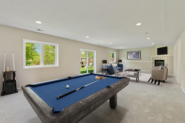 19281 Dunbury Ave, Farmington, MN 55024 - game room with light carpet, recessed lighting, pool table, a tiled fireplace, and baseboards