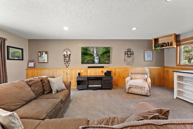 23465 7th St NE, East Bethel, MN 55005 - living room with carpet floors, recessed lighting, and a textured ceiling