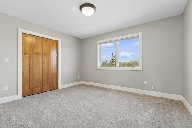 206 Fairway Cir, Glencoe, MN 55336 - unfurnished bedroom with light carpet and a closet