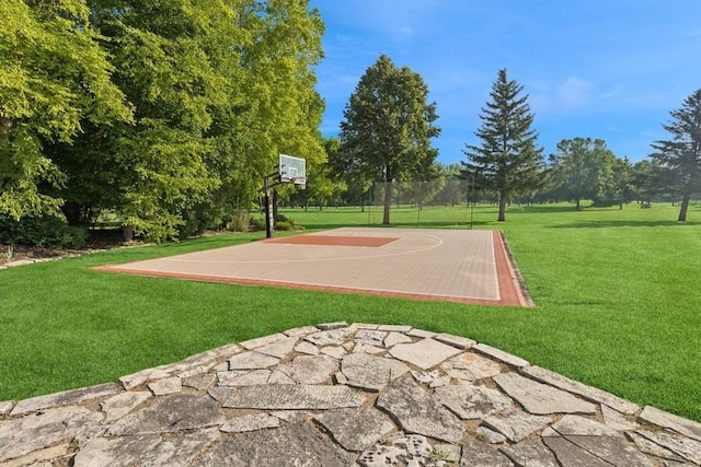 206 Fairway Cir, Glencoe, MN 55336 - view of basketball court with a yard and basketball hoop