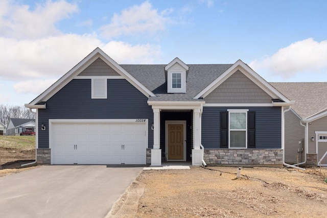 10054 Mulberry Ln, Corcoran, MN 55374 - craftsman inspired home with concrete driveway, stone siding, roof with shingles, and an attached garage