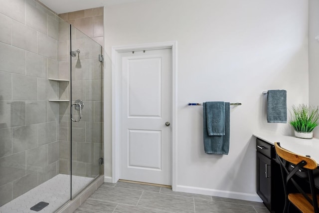 10054 Mulberry Ln, Corcoran, MN 55374 - bathroom featuring a stall shower and baseboards