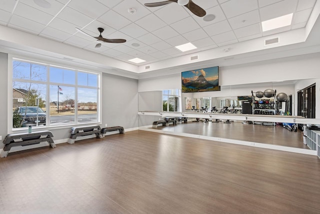 10054 Mulberry Ln, Corcoran, MN 55374 - workout area featuring a wealth of natural light, a ceiling fan, visible vents, and a drop ceiling