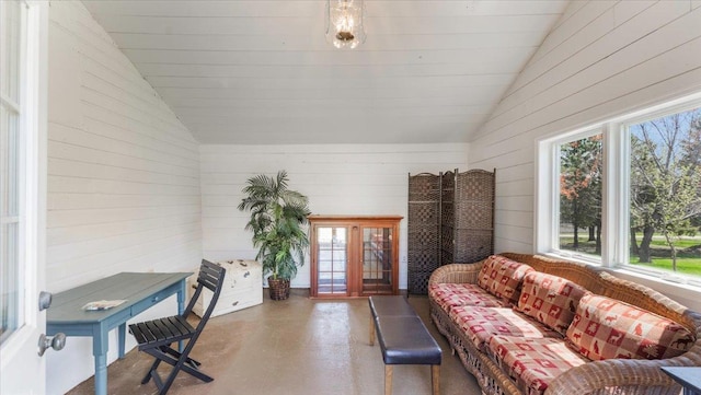 sunroom / solarium featuring french doors