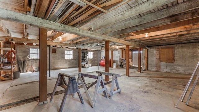 below grade area with concrete block wall