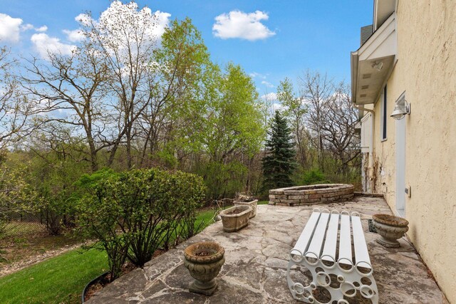 1360 Skyline Dr, Golden Valley, MN 55422 - view of patio with an outdoor fire pit