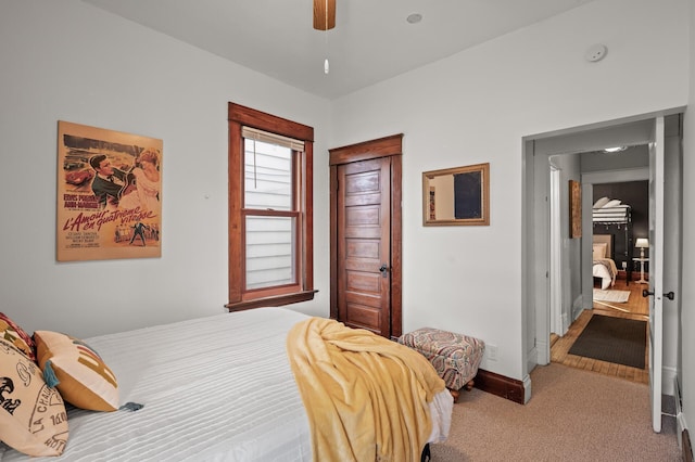 1005 Mclean Ave, Saint Paul, MN 55106 - carpeted bedroom featuring baseboards and a ceiling fan