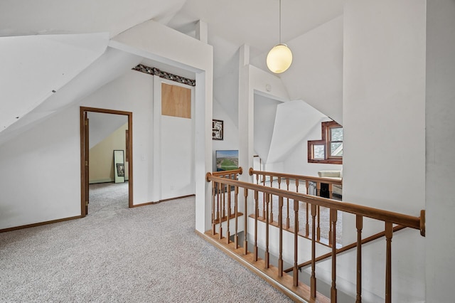 1005 Mclean Ave, Saint Paul, MN 55106 - corridor featuring an upstairs landing, lofted ceiling, carpet, and baseboards