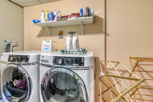 clothes washing area with laundry area and independent washer and dryer