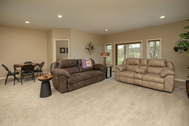 carpeted living room with baseboards and recessed lighting