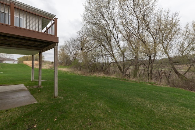 view of yard featuring a deck