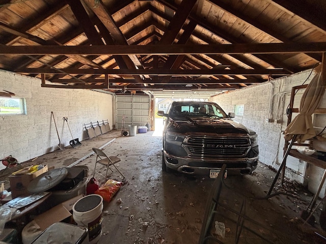 garage featuring concrete block wall