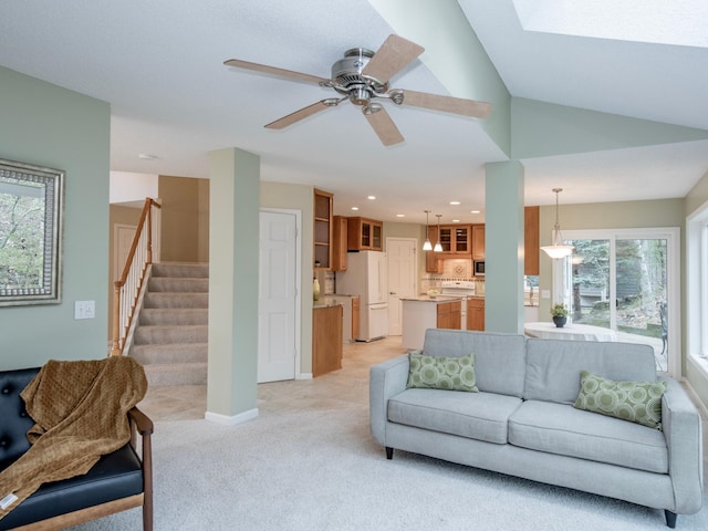 living room with recessed lighting, stairway, vaulted ceiling, light carpet, and a ceiling fan