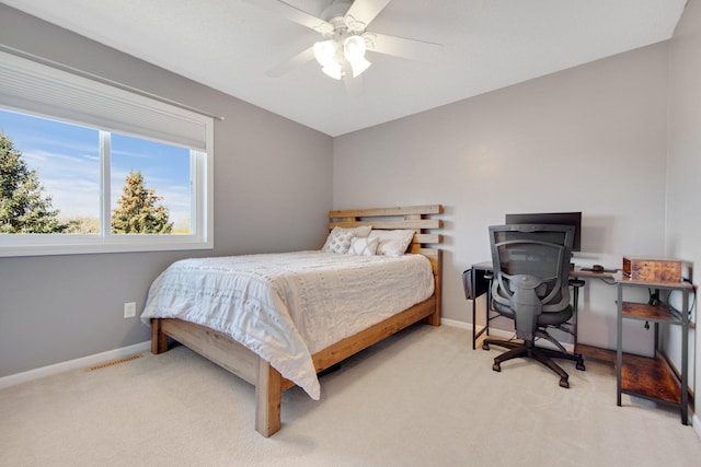 bedroom featuring baseboards, carpet, and visible vents