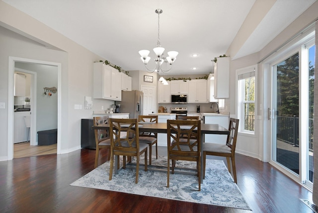 dining room with recessed lighting, baseboards, dark wood finished floors, and a chandelier