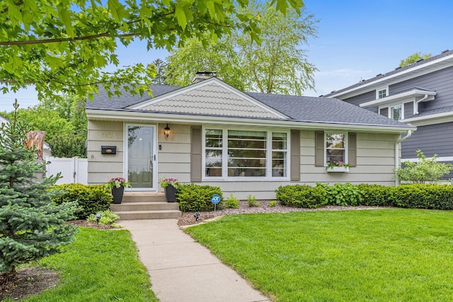 5108 Hankerson Ave, Edina, MN 55436 - view of front of house with a chimney and roof with shingles