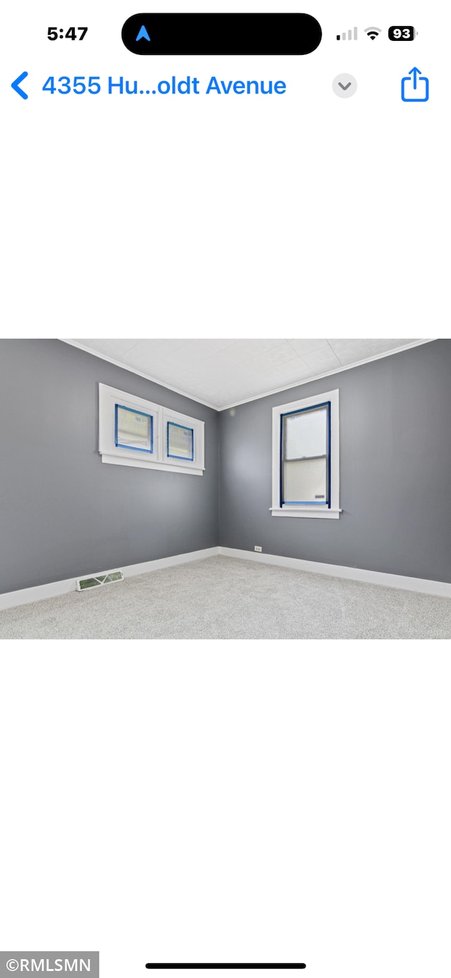 4355 Humboldt Ave N, Minneapolis, MN 55412 - empty room featuring carpet and baseboards