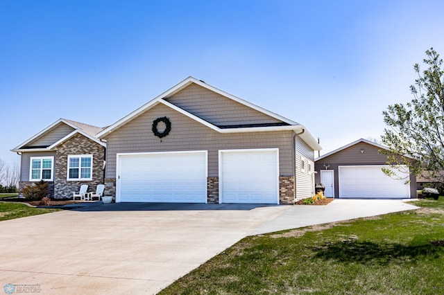 view of front of home featuring an attached garage and driveway