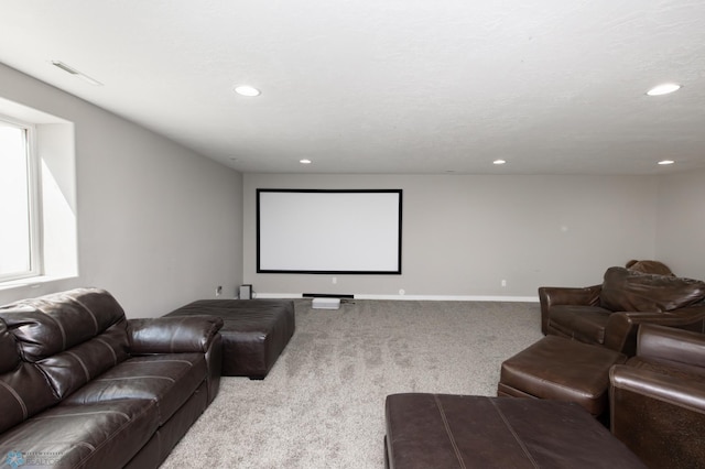 cinema with baseboards, recessed lighting, and carpet