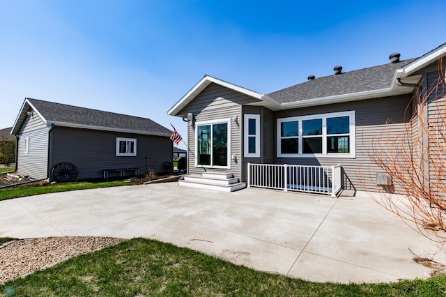 rear view of house with a patio