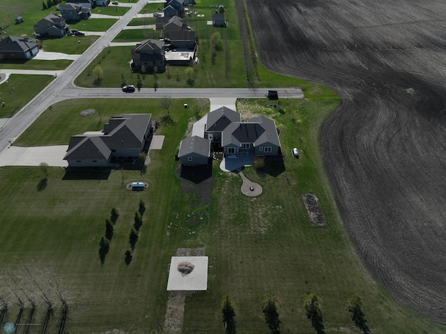 aerial view of property's location with nearby suburban area
