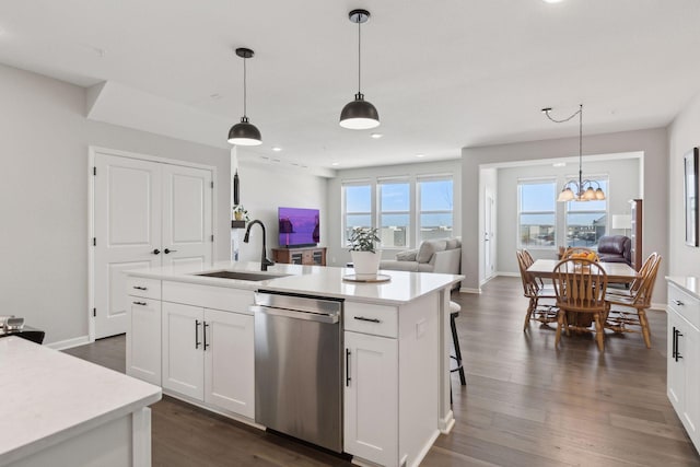 173 Junco Rd N, Lake Elmo, MN 55042 - kitchen with dishwasher, a sink, open floor plan, light countertops, and an island with sink