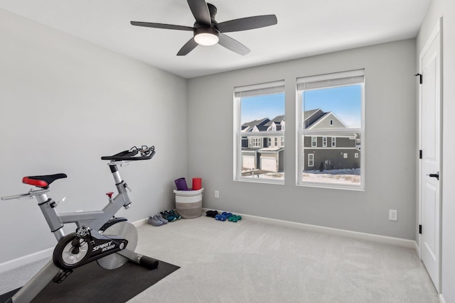 173 Junco Rd N, Lake Elmo, MN 55042 - exercise area with carpet floors, a ceiling fan, and baseboards