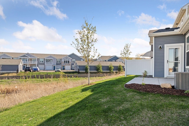 173 Junco Rd N, Lake Elmo, MN 55042 - view of yard with a residential view and central AC unit