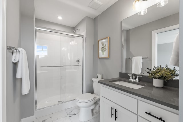 full bath featuring marble finish flooring, a shower stall, toilet, vanity, and recessed lighting
